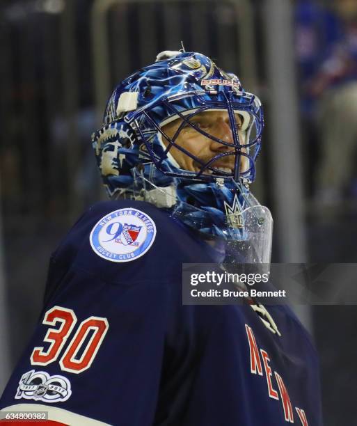 Henrik Lundqvist of the New York Rangers laughs as Kevin Klein misses an attempt at a hattrick during the third period against the Colorado Avalanche...