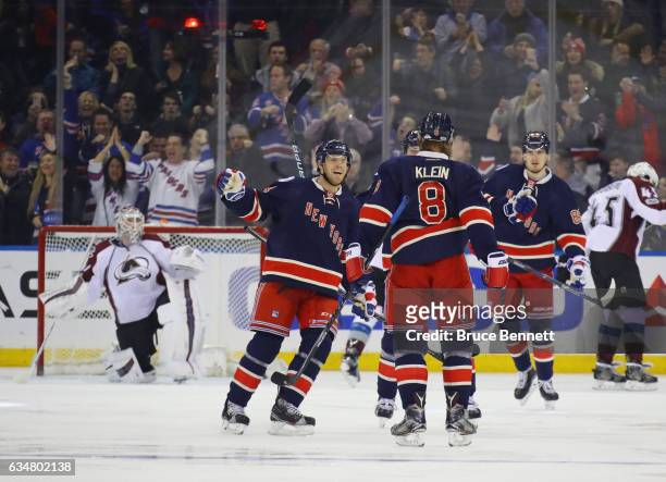 The New York Rangers celebrate a third period goal by Kevin Klein against Calvin Pickard of the Colorado Avalanche at Madison Square Garden on...