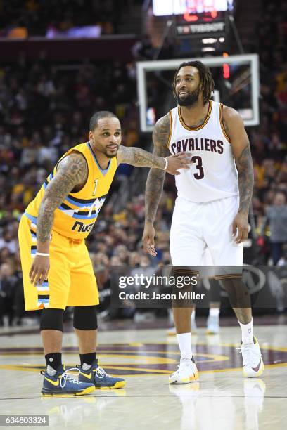 Jameer Nelson of the Denver Nuggets guards Derrick Williams of the Cleveland Cavaliers during the second half at Quicken Loans Arena on February 11,...