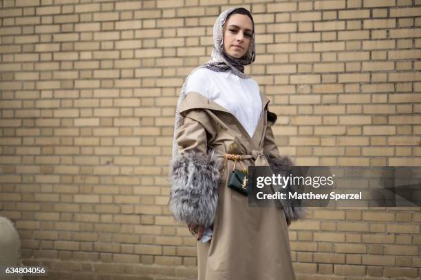 Marwa Biltagi is seen attending Taoray Wang/Creatures of the Wind during New York Fashion Week wearing Gucci, Burberry, Ralph Lauren, and YSL on...