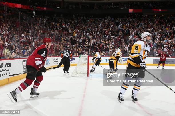 Connor Murphy of the Arizona Coyotes celebrates after scoring the game winning goal against the Pittsburgh Penguins in overtime of the NHL game at...