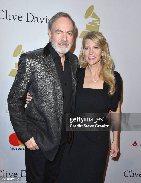 Singer-songwriter Neil Diamond and Katie McNeil attend Pre-GRAMMY Gala and Salute to Industry Icons Honoring Debra Lee at The Beverly Hilton on...