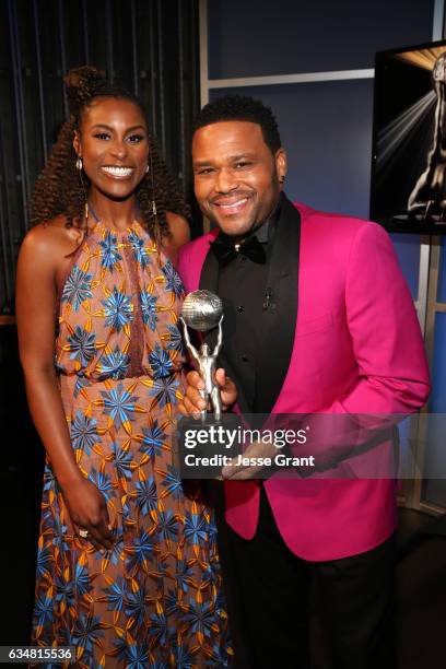 Issa Rae and host Anthony Anderson attend the 48th NAACP Image Awards at Pasadena Civic Auditorium on February 11, 2017 in Pasadena, California.