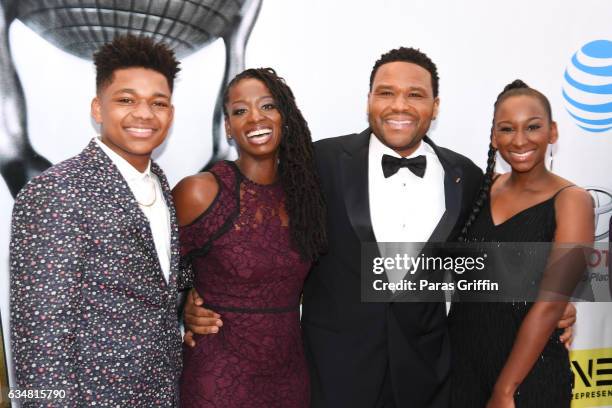 Nathan Anderson, Alvina Stewart, actor Anthony Anderson, and Kyra Anderson attend the 48th NAACP Image Awards at Pasadena Civic Auditorium on...