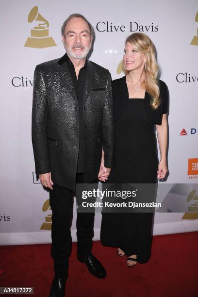 Singer Neil Diamond and Katie McNeil attend Pre-GRAMMY Gala and Salute to Industry Icons Honoring Debra Lee at The Beverly Hilton on February 11,...