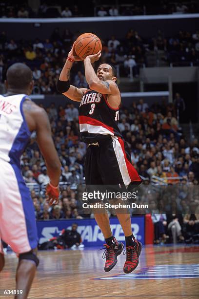 Damon Stoudmire of the Portland Trail Blazers tries for a three point shot during the game against the Los Angeles Clippers at the STAPLES Center in...