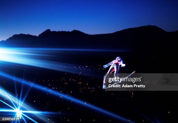 Ryoyu Kobayashi of Japan soars through the air during his qualification jump on Day 1 of the 65th Four Hills Tournament ski jumping event on December...