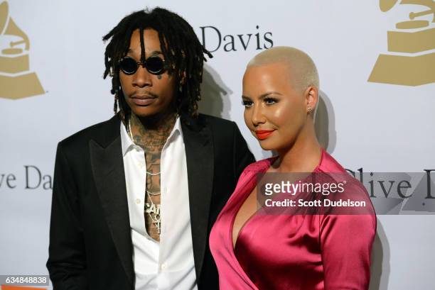 Musician Wiz Khalifa and Amber Rose walk the red carpet at Clive Davis annual Pre-Grammy Gala at The Beverly Hilton Hotel on February 11, 2017 in...