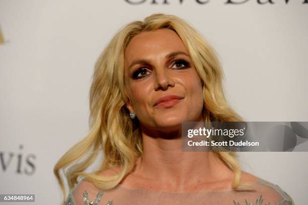 Singer Britney Spears walks the red carpet at the 2017 Pre-GRAMMY Gala And Salute to Industry Icons Honoring Debra Lee at The Beverly Hilton Hotel on...