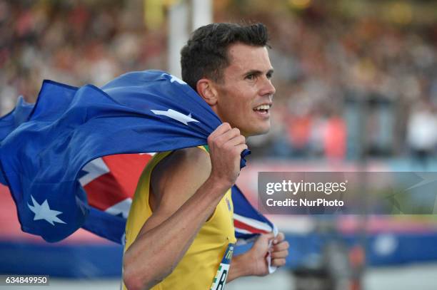 Jeff Riseley of Australia celebrates winning the Mixed sprint relay during Nitro Athletics at Lakeside Stadium on February 11, 2017 in Melbourne,...