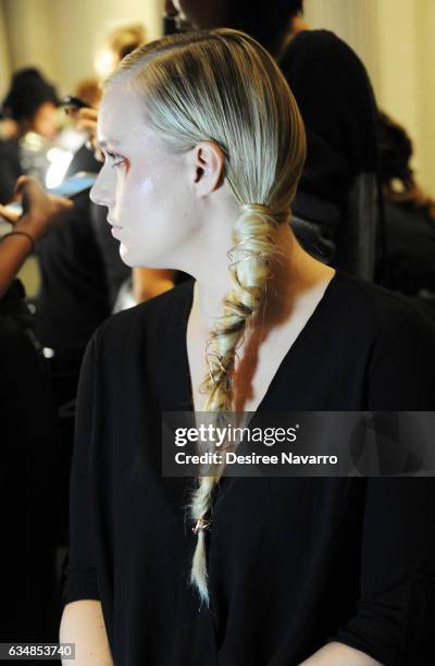 Model, hair detail, prepares backstage at the Christian Siriano show during, New York Fashion Week: The Shows at The Plaza Hotel on February 11, 2017...