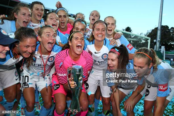 Melbourne City players pose with the trophy after winning the 2017 W-League Grand Final match between the Perth Glory and Melbourne City FC at nib...