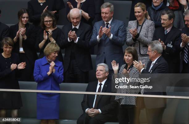 Outgoing German President Joachim Gauck recieves a standing ovation from First Lady Daniela Schadt , former President Christian Wulff and Wulff's...
