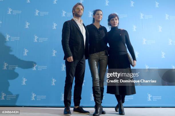 Actor Ozgur Cevik, director Ceylan Ozgun Ozcelik and actress Algi Eke attend the 'Inflame' photo call during the 67th Berlinale International Film...