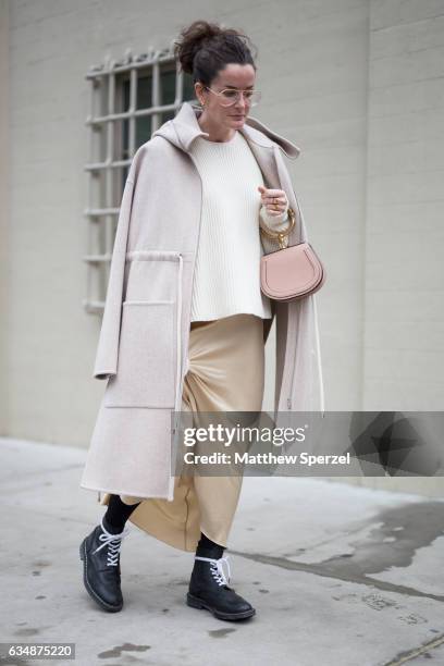 Lucy Chadwick is seen attending Ryan Roche during New York Fashion Week wearing an off-white outfit on February 11, 2017 in New York City.