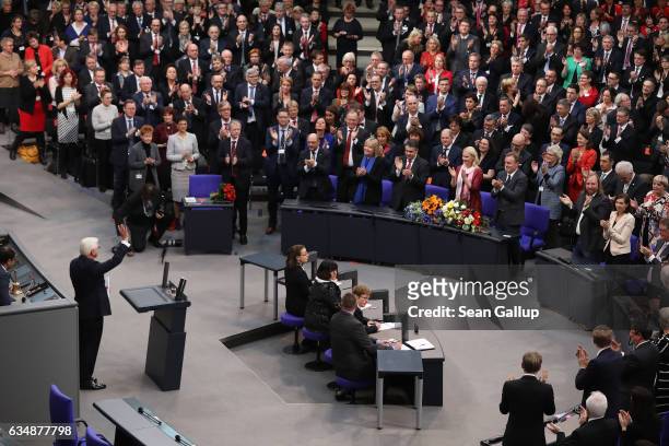German President-elect Frank-Walter Steinmeier waves after he gave a speech following his election as new German president by the Federal Assembly at...