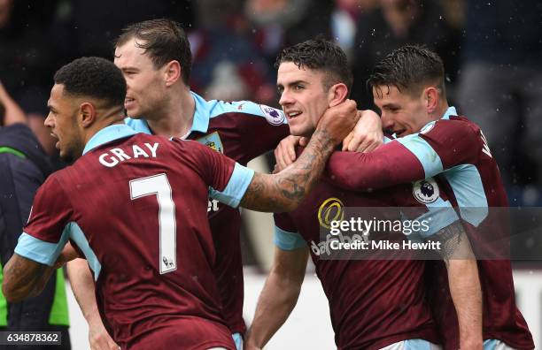 Robbie Brady of Burnley celebrates scoring his sides first goal with team mates during the Premier League match between Burnley and Chelsea at Turf...