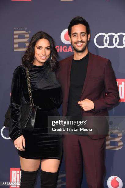 Sami Slimani and his sister Lamiya Slimani attend the PLACE TO B Party at Borchardt on February 11, 2017 in Berlin, Germany.