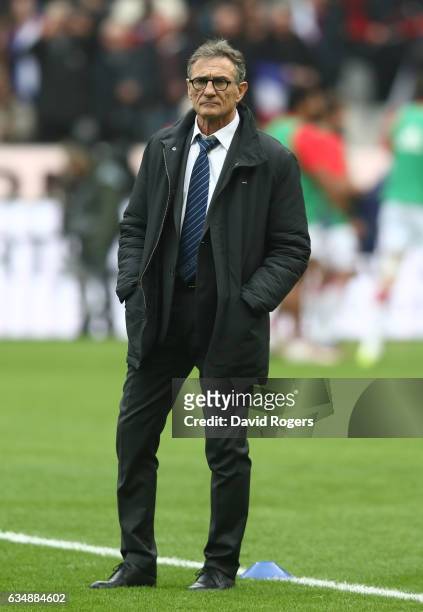 Guy Noves the France head coach supervises his team warm up prior to kickoff during the RBS Six Nations match between France and Scotland at Stade de...