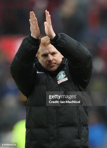 Neil Lennon the manager of Hibernian waves to the fans following the final whistle during the Scottish Cup fifth round match between Heart of...