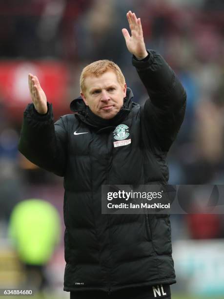 Neil Lennon the manager of Hibernian waves to the fans following the final whistle during the Scottish Cup fifth round match between Heart of...