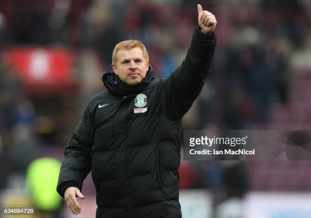 Neil Lennon the manager of Hibernian waves to the fans following the final whistle during the Scottish Cup fifth round match between Heart of...