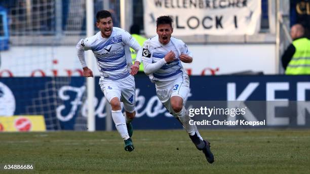Fabian Schnellhardt of Duisburg celebrates the third goal with Dustin Bomheuer of Duisburg during the Third League match between MSV Duisburg and...