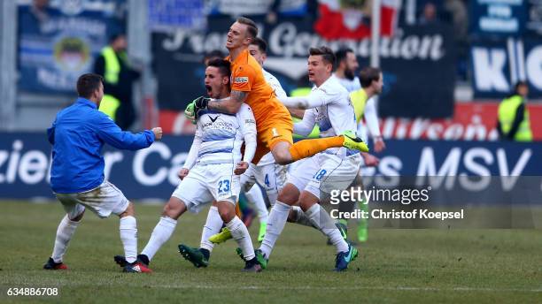 Fabian Schnellhardt of Duisburg celebrates the decision thrid goal with his team mates during the Third League match between MSV Duisburg and...