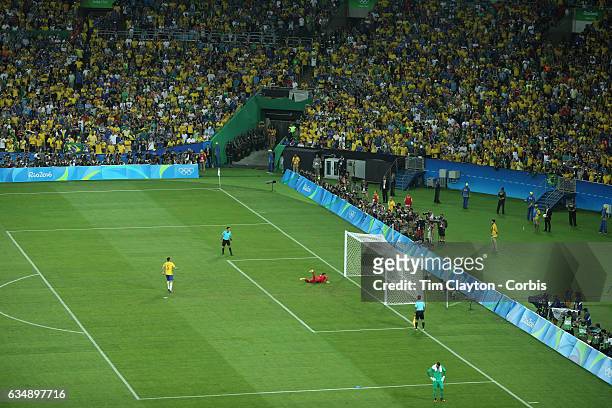 Day 15 Renato Augusto of Brazil scores from the penalty spot during the penalty shoot out beating Timo Horn of Germany during the Brazil Vs Germany...