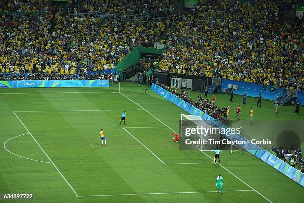 Day 15 Rafinha of Brazil scores from the penalty spot during the penalty shoot out beating Timo Horn of Germany during the Brazil Vs Germany Men's...