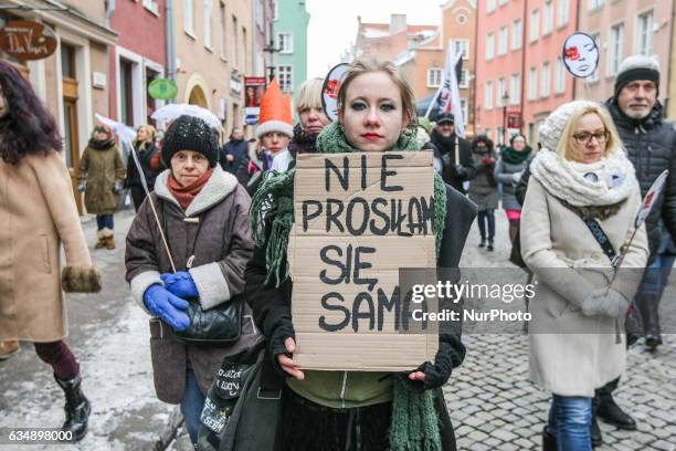 Protester holding the banner that speaks ' I did not ask for it ' is seen on 12 February 2017 in Gdansk, Poland . Organisers - Dziewuchy Dziewuchom...