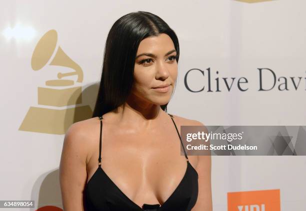 Personality Kourtney Kardashian poses on the red carpet at the 2017 Pre-GRAMMY Gala And Salute to Industry Icons Honoring Debra Lee at The Beverly...