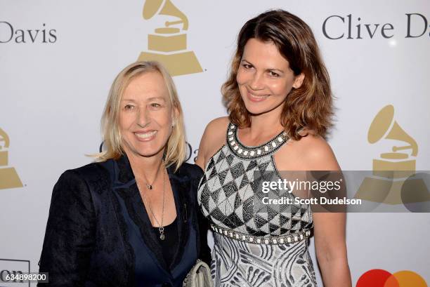 Tennis player Martina Navratilova and Julia Lemigova attend the Clive Davis pre Grammy gala at The Beverly Hilton Hotel on February 11, 2017 in...