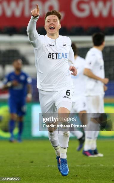 Alfie Mawson of Swansea City celebrates scoring his sides first goal of the match during the Premier League match between Swansea City and Leicester...