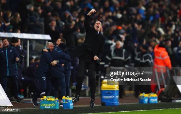 Paul Clement manager of Swansea City celebrates as Martin Olsson of Swansea City scores their second goal during the Premier League match between...