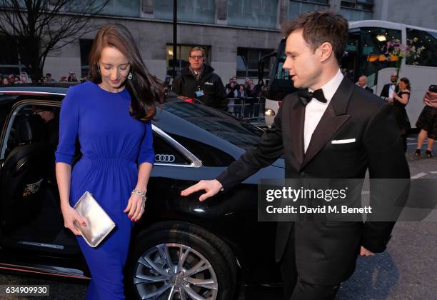 Guest and Rupert Evans arrive in an Audi at the EE BAFTA Film Awards at the at Royal Albert Hall on February 12, 2017 in London, England.