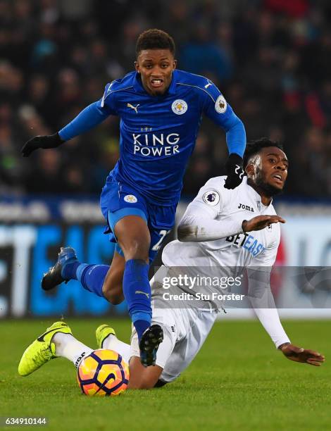 Demarai Gray of Leicester City evades Leroy Fer of Swansea City during the Premier League match between Swansea City and Leicester City at Liberty...