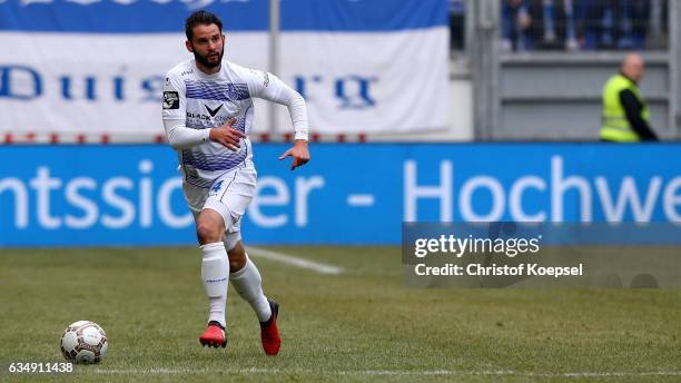 Tim Albutat of Duisburg runs with the ball during the Third League match between MSV Duisburg and Preussen Muenster at Schauinslandreisen-Arena on...