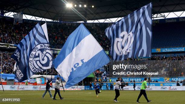 Fans of Duisburg wave flags prior to the Third League match between MSV Duisburg and Preussen Muenster at Schauinslandreisen-Arena on February 12,...