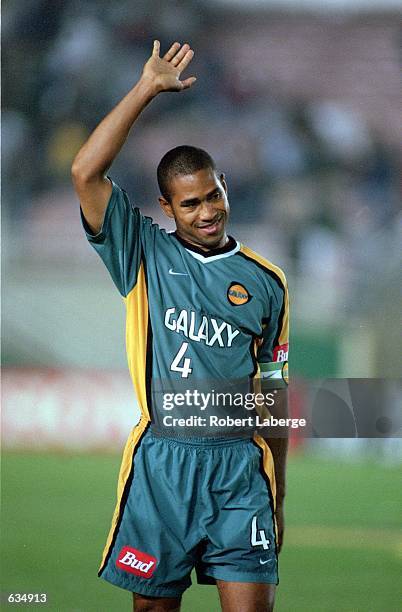 Robin Fraser of the Los Angeles Galaxy raises his hand on the field during the game against the Kansas City Wizards at the Rose Bowl in Pasadena,...