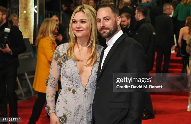 Julia Stiles and Preston J.Cook attend the 70th EE British Academy Film Awards at Royal Albert Hall on February 12, 2017 in London, England.