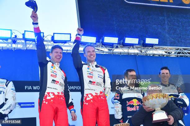 Jari Matti Latvala of Finland and Mikka Anttila of Finland celebrate their victory in the final podium in Torsby during Day Three of the WRC Sweden...