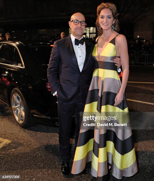 Stanley Tucci and Felicity Blunt arrive in an Audi at the EE BAFTA Film Awards at the at Royal Albert Hall on February 12, 2017 in London, England.