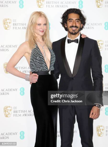 Actress Nicole Kidman and Dev Patel pose in the winners room during the 70th EE British Academy Film Awards at Royal Albert Hall on February 12, 2017...