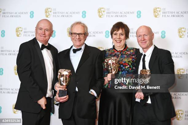 Dave Johns, Ken Loach, Rebecca O'Brien and Paul Laverty, accepting the Outstanding British Film award for "I, Daniel Blake", pose in the winners room...