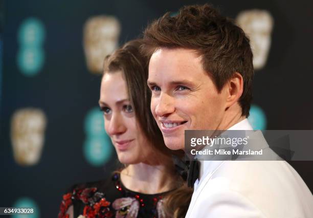 Eddie Redmayne and Hannah Bagshawe attend the 70th EE British Academy Film Awards at Royal Albert Hall on February 12, 2017 in London, England.