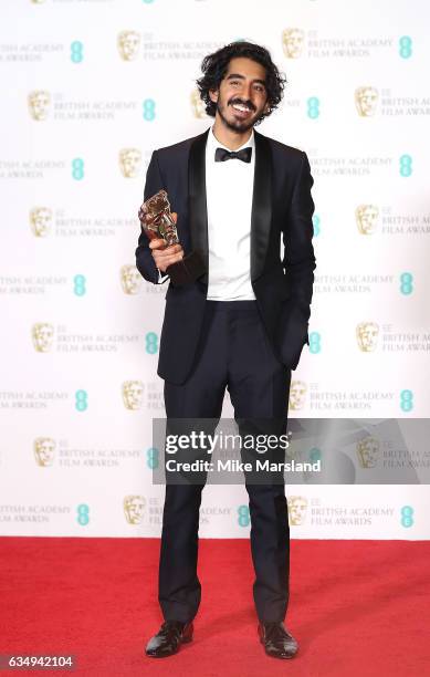 Dev Patel, winner of the Supporting Actor award for 'Lion', poses in the winners room at the 70th EE British Academy Film Awards at Royal Albert Hall...