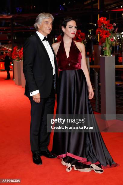 Actor Francisco Reyes and actress Daniela Vega attend the 'A Fantastic Woman' premiere during the 67th Berlinale International Film Festival Berlin...