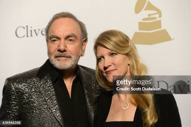 Singer Neil Diamond and wife Katie McNeil attend the Clive Davis annual Pre-Grammy Gala at The Beverly Hilton Hotel on February 11, 2017 in Beverly...