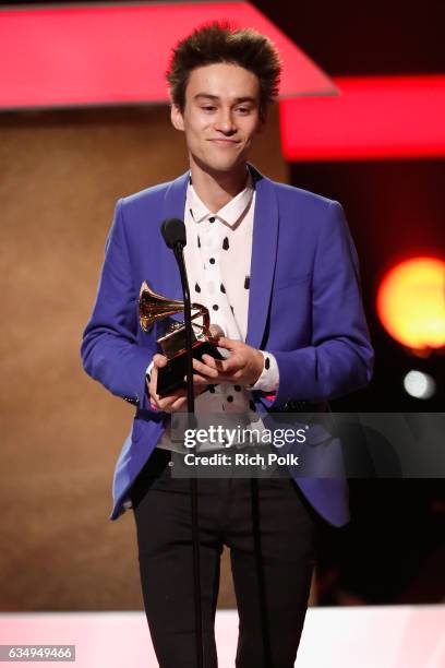 Musical arranger Jacob Collier accepts Best Arrangement, Instruments and Vocals award for 'Flinstones' onstage at the Premiere Ceremony during the...